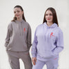 Hoodie with a drawstring and a kangaroo pocket. Arabesque R on chest and Royal Academy of Dance on cuff in red. 
