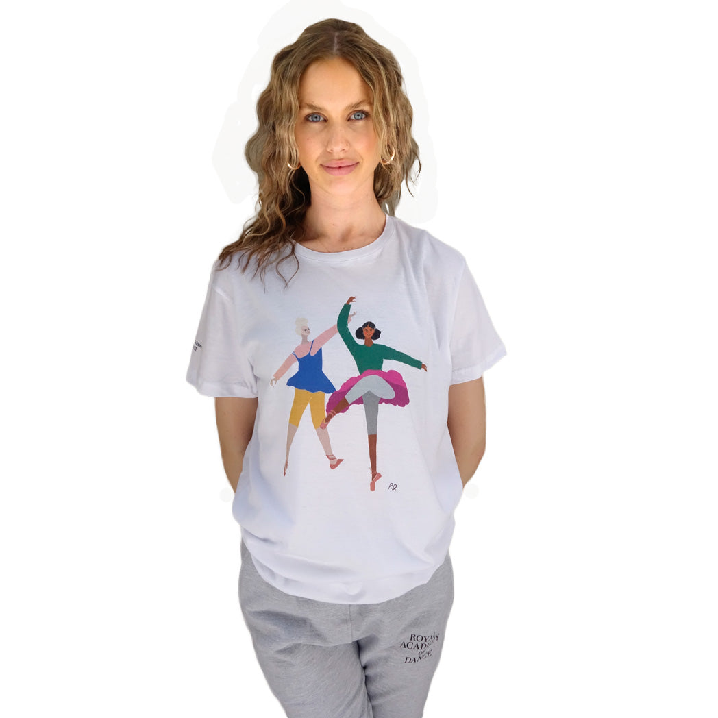 White t-shirt with a graphic of two ballerinas dancing on it, and the Royal Academy of Dance logo on the sleeve.