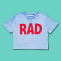 Kids light blue crop top with red 'RAD' logo, Royal Academy of Dance