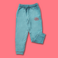 Teal green sweatpants with Royal Academy of Dance logo in red 