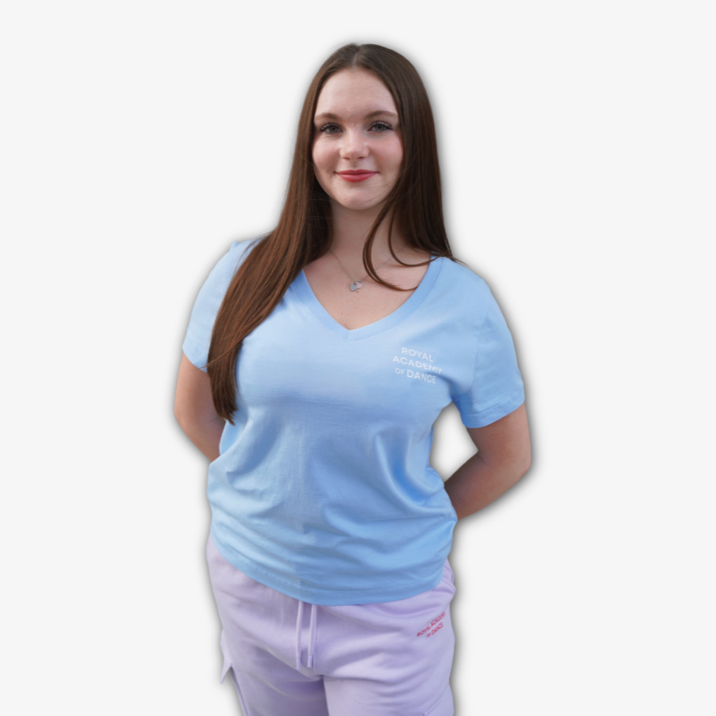 Light blue v neck t-shirt with Royal Academy of Dance logo in white 