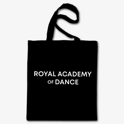 Black tote bag with 'Royal Academy of Dance' text on a white background