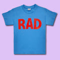 Blue  t-shirt with 'RAD' in red and Royal Academy of Dance logo on back of nape. 