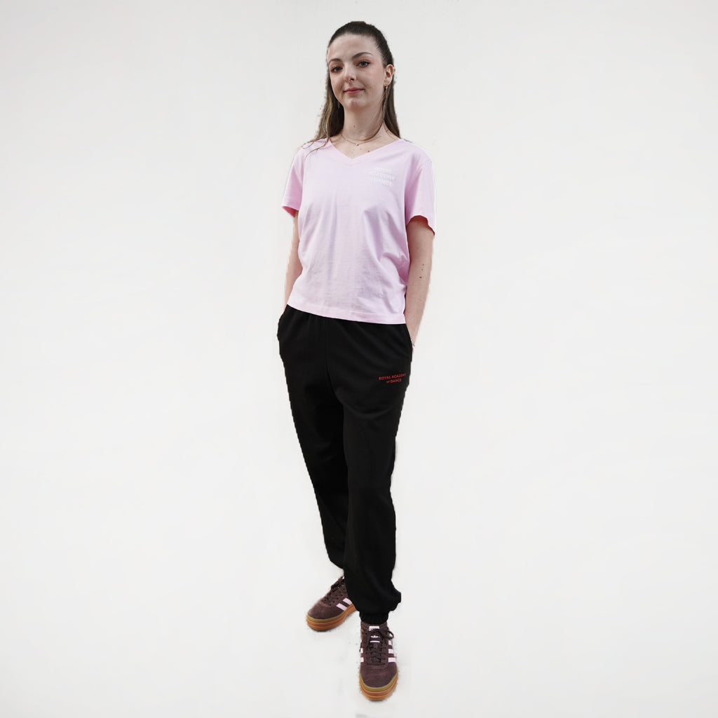 Black fitness jogger with pockets and an elasticated waistband. Royal Academy of Dance logo in red