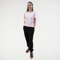 Black fitness jogger with pockets and an elasticated waistband. Royal Academy of Dance logo in red