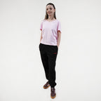 Black fitness jogger with pockets and an elasticated waistband. Royal Academy of Dance logo in red