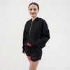 Black jogger shorts with the logo Royal Academy of Dance in red