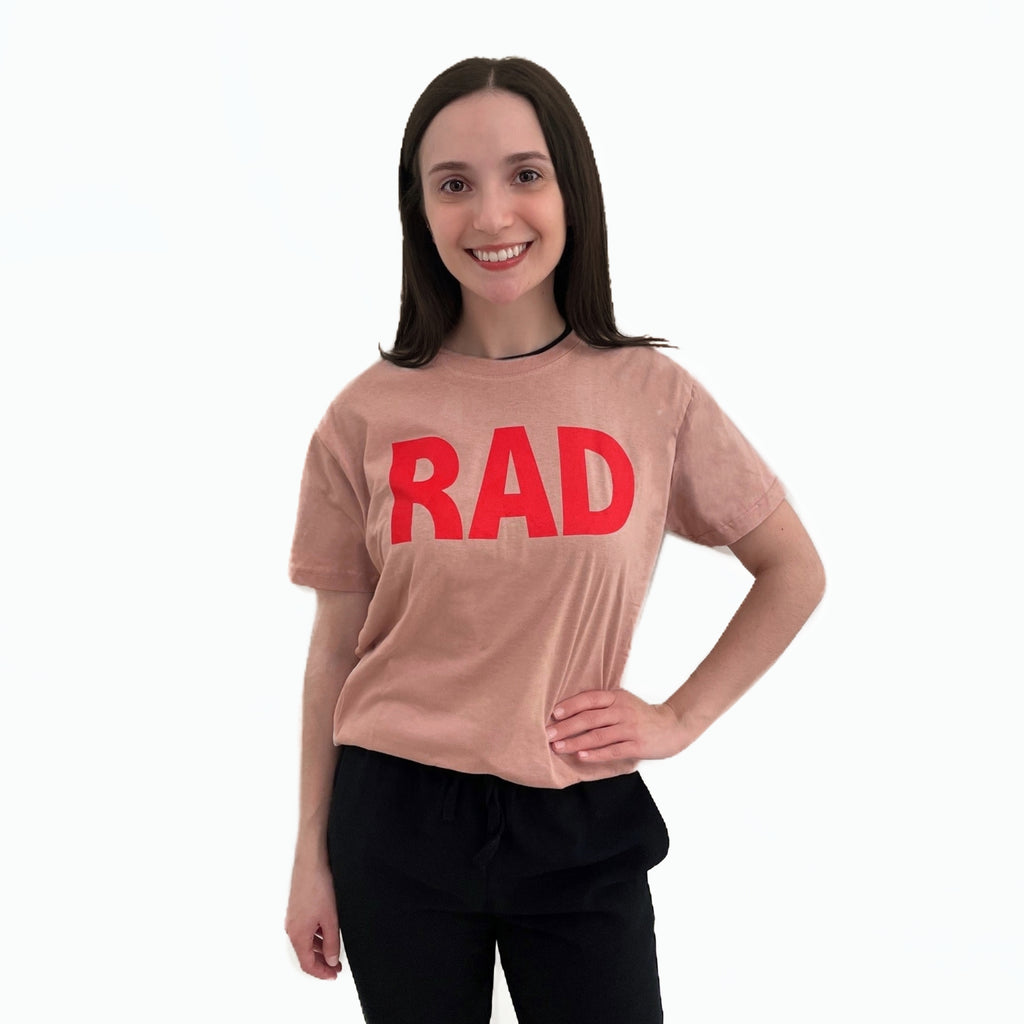 Dusty pink t-shirt with the word 'RAD' printed in red block letters, Royal Academy of Dance