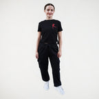 Black fitness jogger with cargo pockets and an elasticated waistband. Royal Academy of Dance logo in red