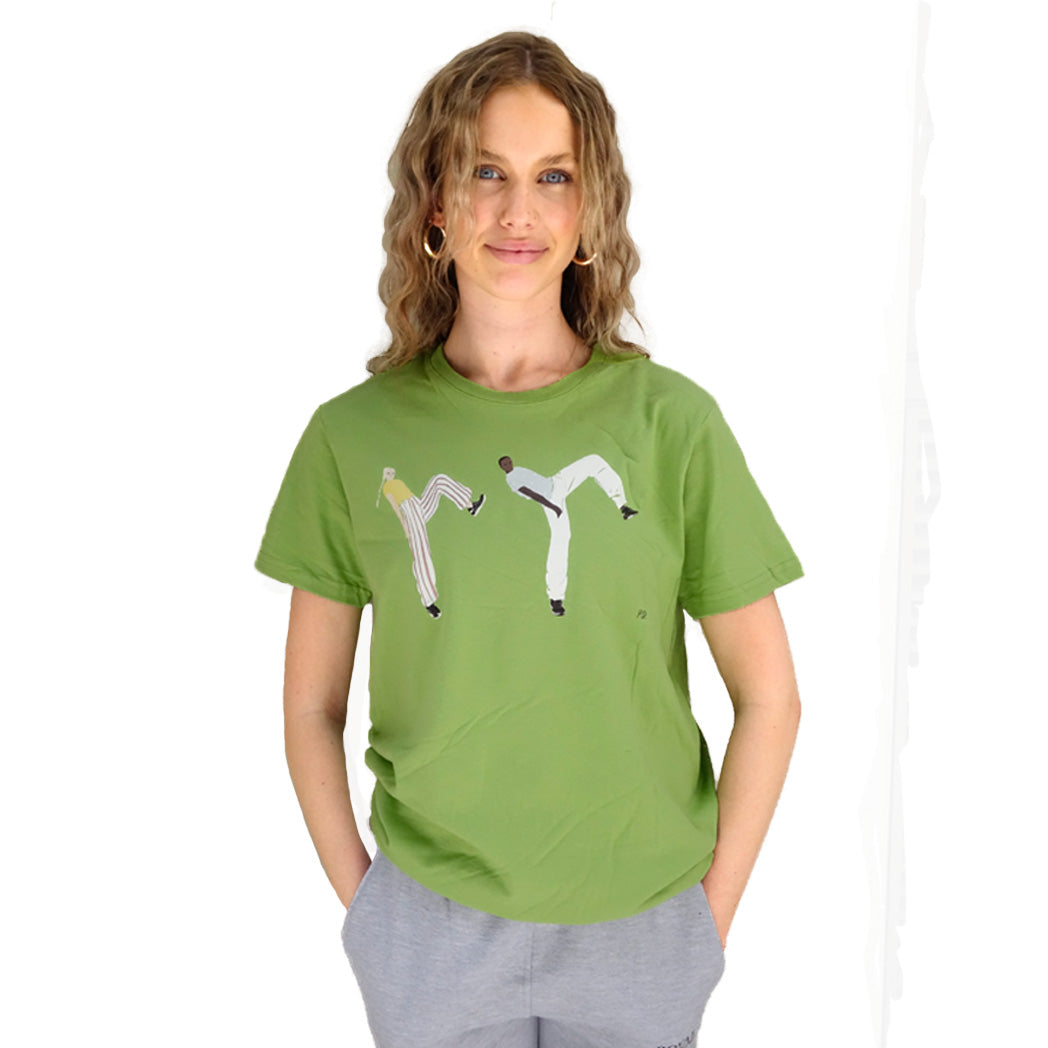 Green t-shirt with a graphic of two people dancing on it, and the Royal Academy of Dance logo on the sleeve.