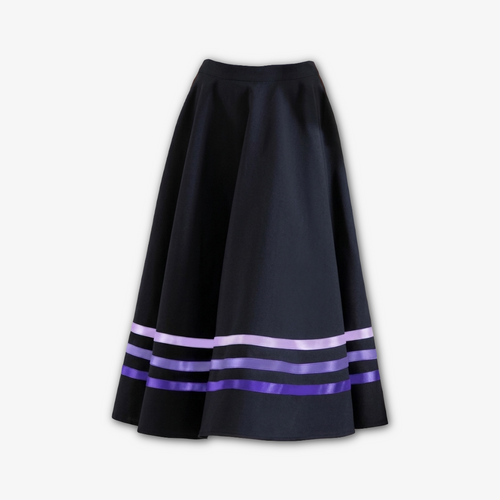A professional RAD character skirt for ballet class, featuring a high-quality black circular design with elegant  purple ribbon detailing. Perfect for the balletcore aesthetic, this exam-approved uniform is crafted for freedom of movement during character dance work. The mid-calf length and satin ribbons meet Royal Academy of Dance standards for all ballet grades, offering a flattering silhouette and adjustable velcro fastening.