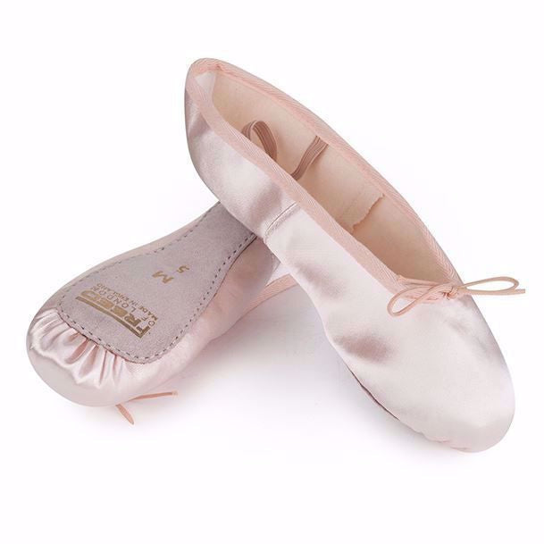 RAD approved pink satin ballet shoes for female dancers, featuring a full suede sole and pre-sewn elastics. Ideal for Royal Academy of Dance exam uniforms across all grades, these technical ballet slippers provide a professional fit. Customers searching for "ballet pink satin" and "full sole technical shoes" prioritize these for exams. As these shoes often require one size larger than street footwear, refer to the sizing guide for a perfect fit.